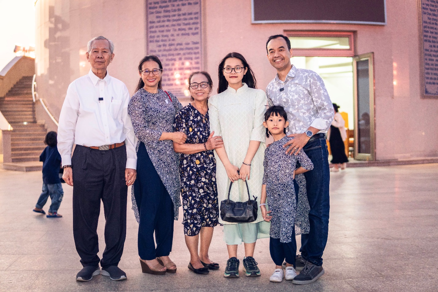 A group of people posing for a photo Description automatically generated